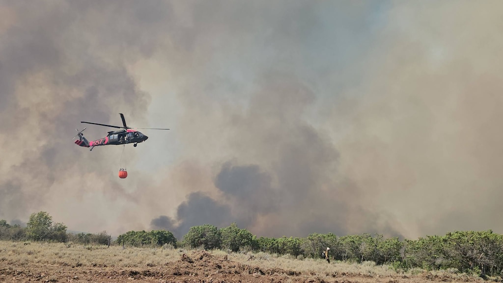 (Utah Fire Info) Smoke from the Rocky Canyon Fire burning more than 13,000 acres north of Salt Lake City on Aug. 11, 2026.