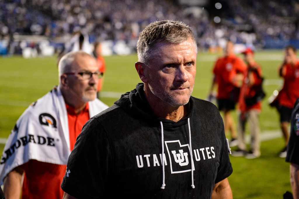 (Trent Nelson  |  The Salt Lake Tribune)  Utah coach Kyle Whittingham walks off the field during a lightning delay as Brigham Young University (BYU) hosts the University of Utah, NCAA football in Provo on Thursday Aug. 29, 2019.