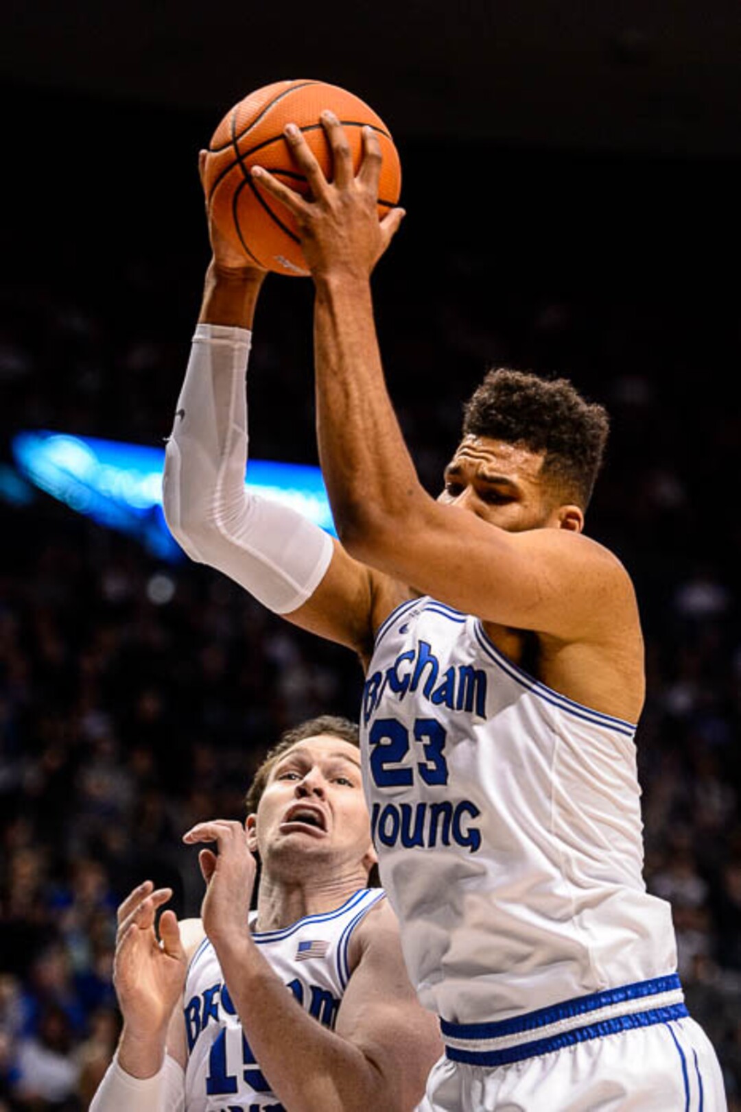 (Trent Nelson | The Salt Lake Tribune)   Brigham Young Cougars forward Yoeli Childs (23) pulls down a rebound as BYU hosts the St. Mary's Gaels, NCAA basketball in Provo, Saturday December 30, 2017. Brigham Young Cougars forward Payton Dastrup (15) at bottom.