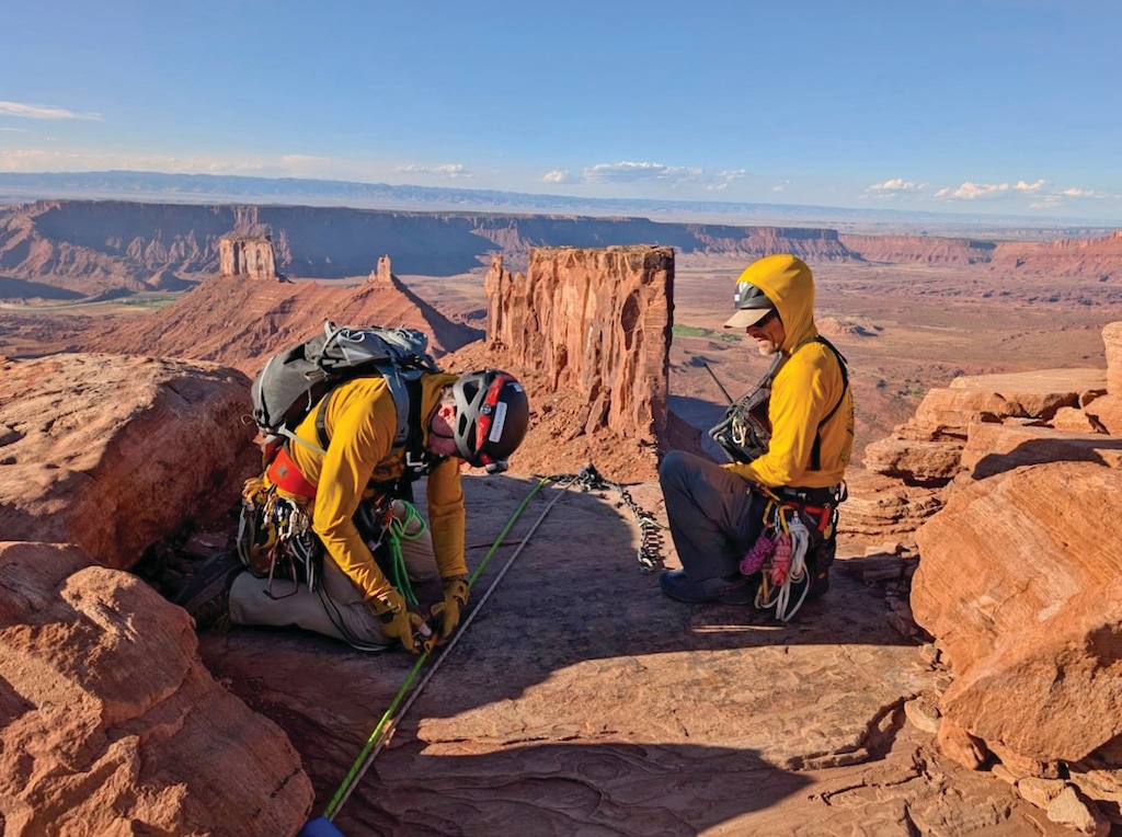 (Grand County Search and Rescue) Grand County Search and Rescue members rigging a technical rope rescue on the top of Castleton Tower near Moab.