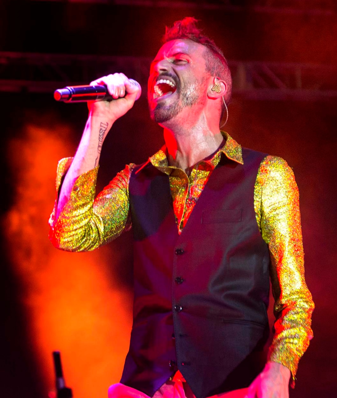 (Rick Egan  |  The Salt Lake Tribune)  Tyler Glenn Sings for Neon Trees, at the LoveLoud Festival at Brent Brown Ballpark at UVU campus, Saturday, August 26, 2017.
