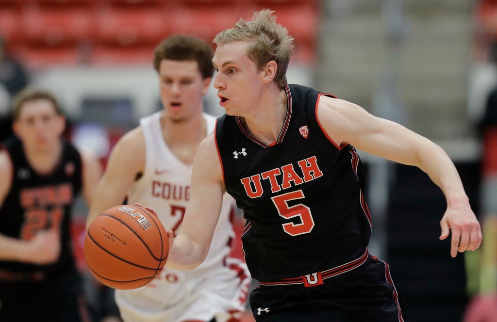 Utah guard Parker Van Dyke (5) brings the ball up during the first half of the team's NCAA college basketball game against Washington State, Saturday, Feb. 17, 2018, in Pullman, Wash. (AP Photo/Ted S. Warren)