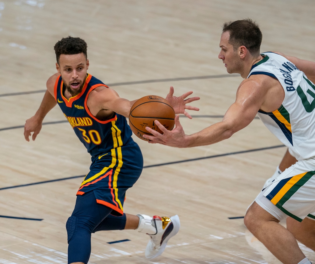 (Rick Egan | The Salt Lake Tribune) Golden State Warriors guard Stephen Curry (30) goes for the ball along with Utah Jazz forward Bojan Bogdanovic (44), in NBA action between the Utah Jazz and the Golden State Warriors at Vivint Arena, on  Saturday, Jan. 23, 2021.