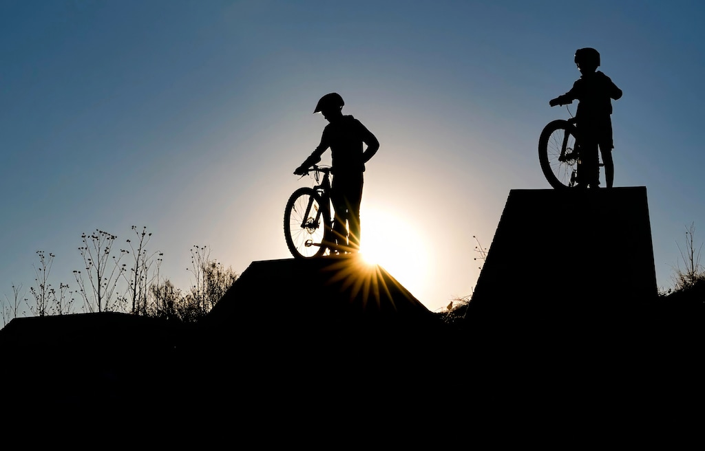 (Francisco Kjolseth | The Salt Lake Tribune) Sam Anderson, 13, and his brother Jacob, 11, assess the “big drops” at a new mountain bike park taking shape at Lodestone Regional Park in Kearns on Thursday, Jan. 30, 2025. The park is one of many that could receive upgrades if Salt Lake County's recreation bond passes.