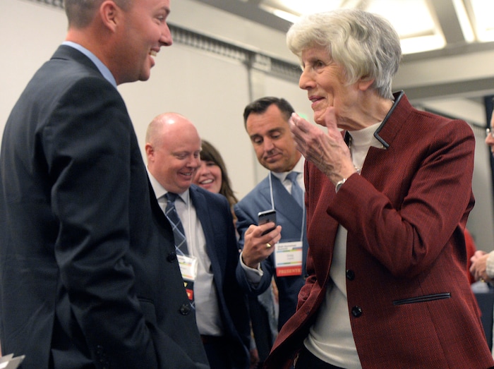(Al Hartmann  |  The Salt Lake Tribune) 	
Lt. Governor Spencer Cox, left, chat with homessness advocate Pamela Atkinson at Utah's 14th Annual Homelessness Summit in Salt Lake City Wednesday Oct. 11.  Behind are Jonathan Hardy, moderator and Greg Hughes, Speaker of the House.  Utah homeless service providers learned from the leaders about the long-term plan to add three new homeless shelters and close the shelter at 210 S. Rio Grande St. — and about how the $67 million Operation Rio Grande has affected that long-term plan.  

