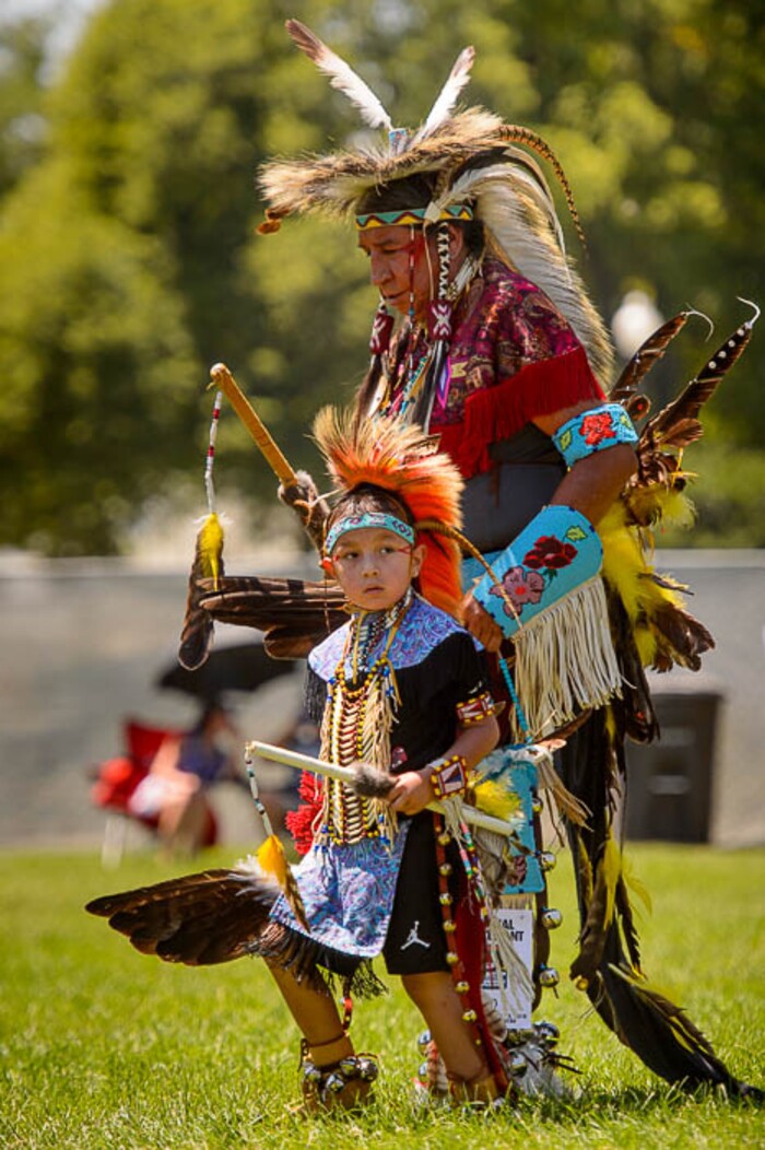 (Trent Nelson | The Salt Lake Tribune)  
24th Annual NACIP Powwow and festival at Liberty Park in Salt Lake City, Tuesday July 24, 2018. Karter Three Irons dances with his grandfather Ira Walks.