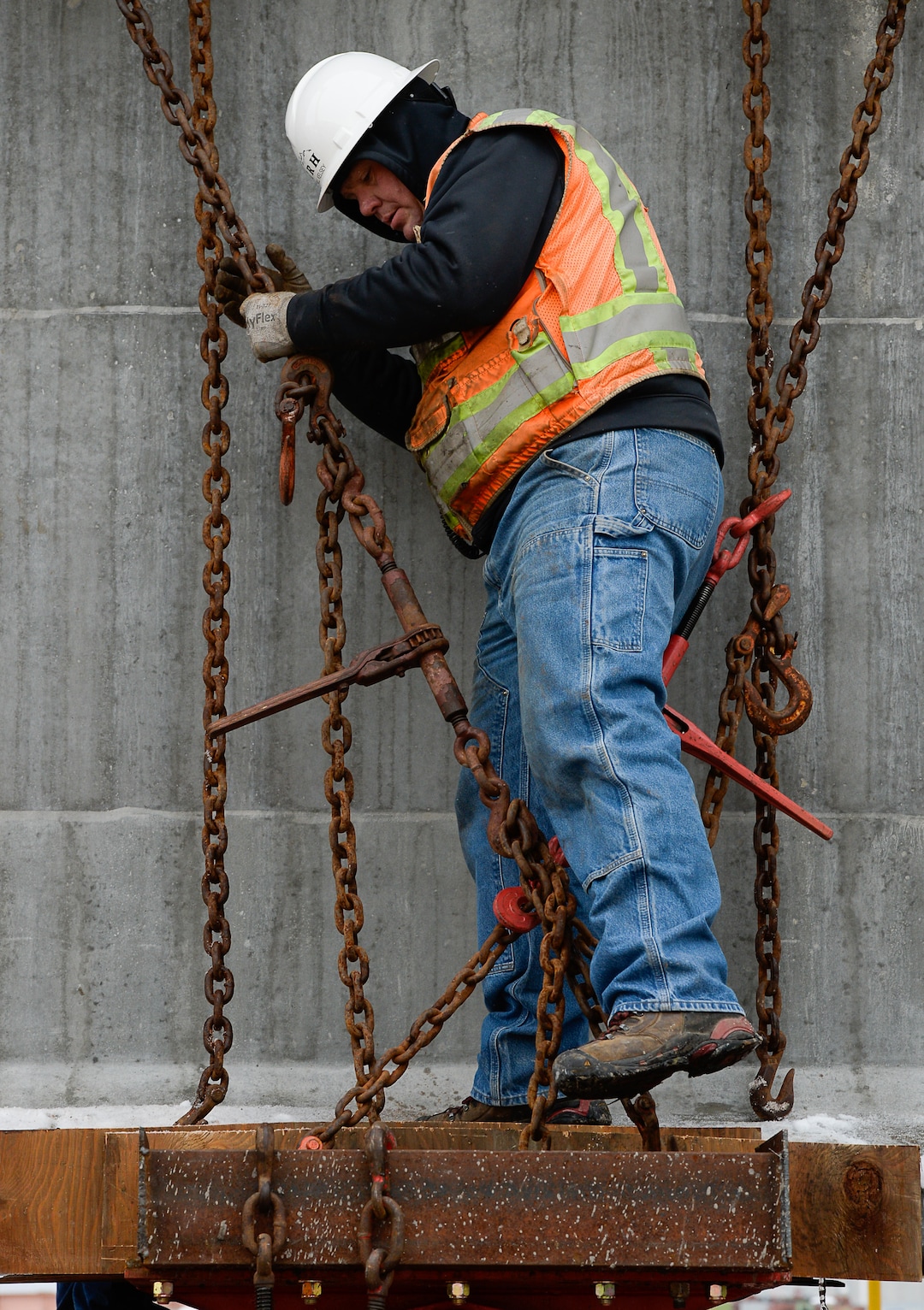 (Francisco Kjolseth  |  The Salt Lake Tribune)  UDOT gets ready to place some of the world's largest-ever bridge beams, and the largest in Utah state history with a span of 203 ft long and just over 8 ft tall, as crews load one on a truck following manufacturing at Forterra Structural Precast in Kearns on Tuesday, Dec. 11, 2018. A total of six beams will be installed in the technology corridor in Lehi later this week.