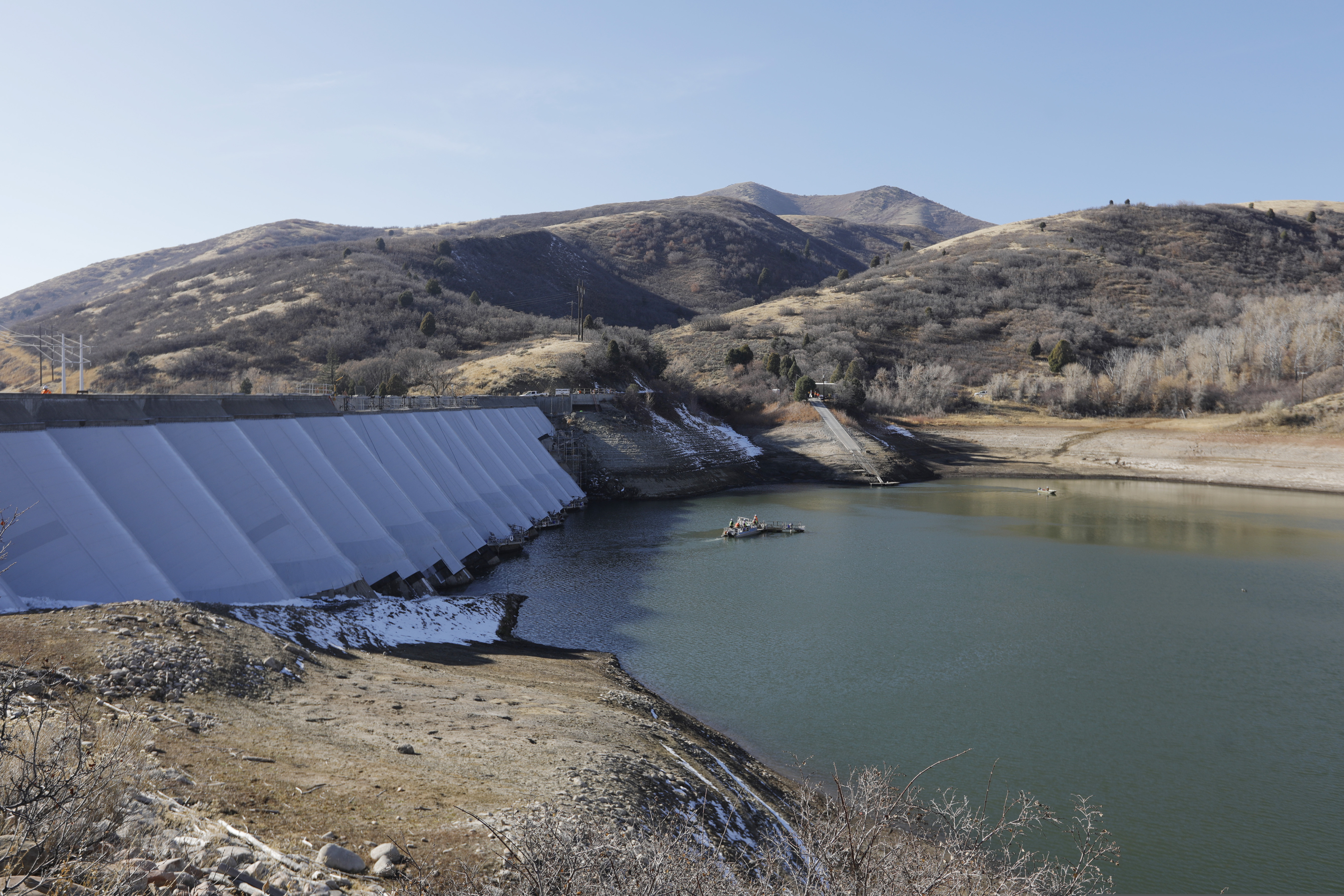 (Rick Bowmer | The Associated Press) This Thursday, Nov. 7, 2019 photo, shows the Mountain Dell Dam, 5 miles east of Salt Lake City. The window-like arches on the outside of the towering Mountain Dell Dam provide an artistic facade that fits with the natural beauty of the Utah mountain canyon where the century-old structure sits. The dam is listed in poor condition because of deteriorating concrete that allows seepage from the reservoir, said David Marble, Utah assistant state engineer.
