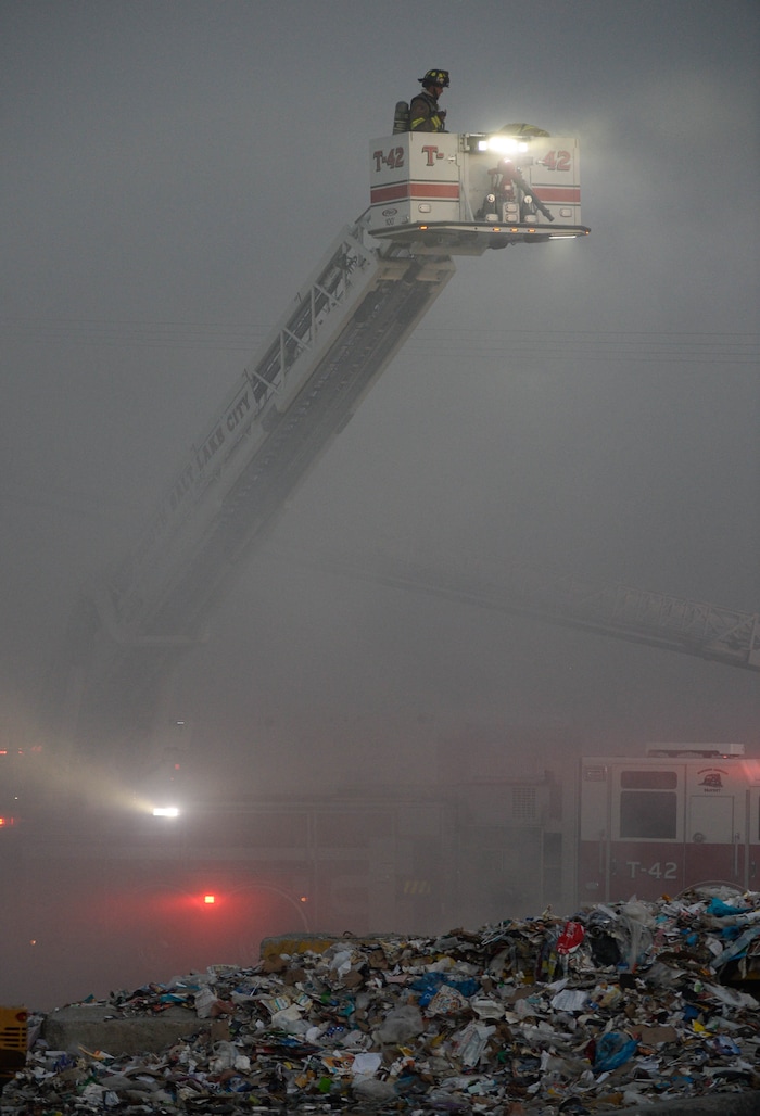 (Francisco Kjolseth  |  The Salt Lake Tribune) Fire crews respond to a fire at Rocky Mountain Recycling South Salt Lake on Saturday, July 11, 2020.