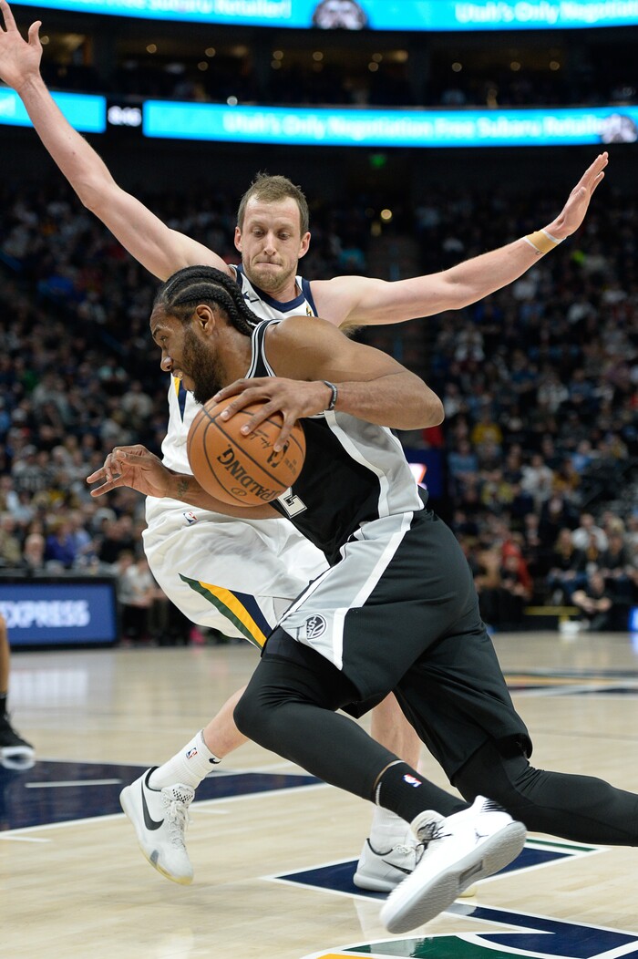 (Francisco Kjolseth  |  The Salt Lake Tribune)  Utah Jazz forward Joe Ingles (2) puts the pressure on San Antonio Spurs forward Kawhi Leonard (2) during the first quarter of an NBA basketball game in Salt Lake City, Thursday, Dec. 21, 2017.