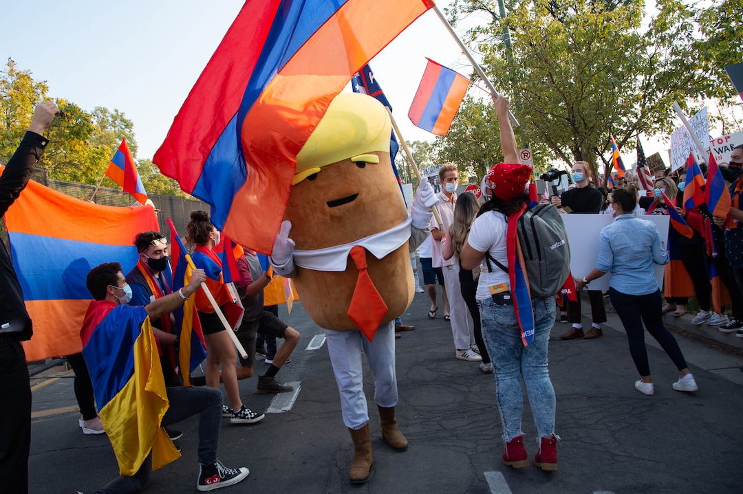 (Francisco Kjolseth  |  The Salt Lake Tribune) The Trump-tater joins supporters of President Donald Trump and a group denouncing Azerbaijan and Turkish president Recep Tayyip Erdogan as they rally outside of Kingsbury Hall on the University of Utah campus in Salt Lake City on Wednesday, Oct. 7, 2020, before the vice presidential debate.