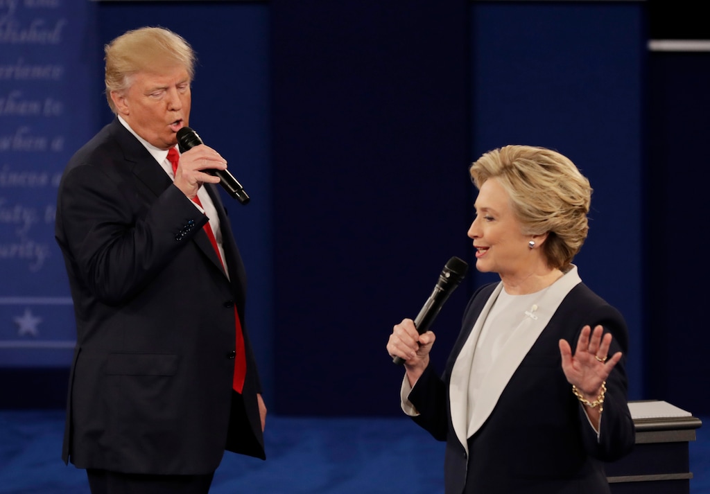 (Patrick Semansky | AP file photo)  Republican presidential nominee Donald Trump and Democratic presidential nominee Hillary Clinton speak during the second presidential debate at Washington University in St. Louis on Oct. 9, 2016. The second 2016 presidential debate was two days after the release of the 2005 “Access Hollywood” tape of Trump boasting about grabbing women by the genitals, and Trump was determined to change the narrative.