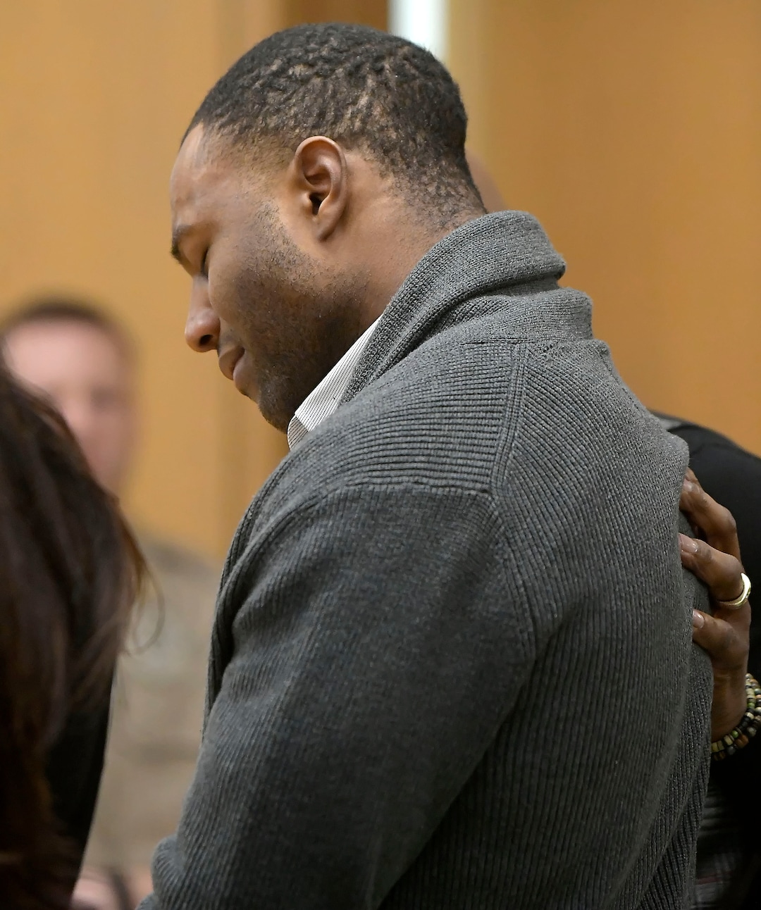 Torrey Green reacts as a jury finds him guilty of eight charges including five counts of rape and a charge sexual battery in connection to reports from six women accusing him of sexual assault while he was a football player at Utah State University, Friday, Jan.18, 2019 in Brigham City, Utah. (Eli Lucero/Herald Journal via AP)