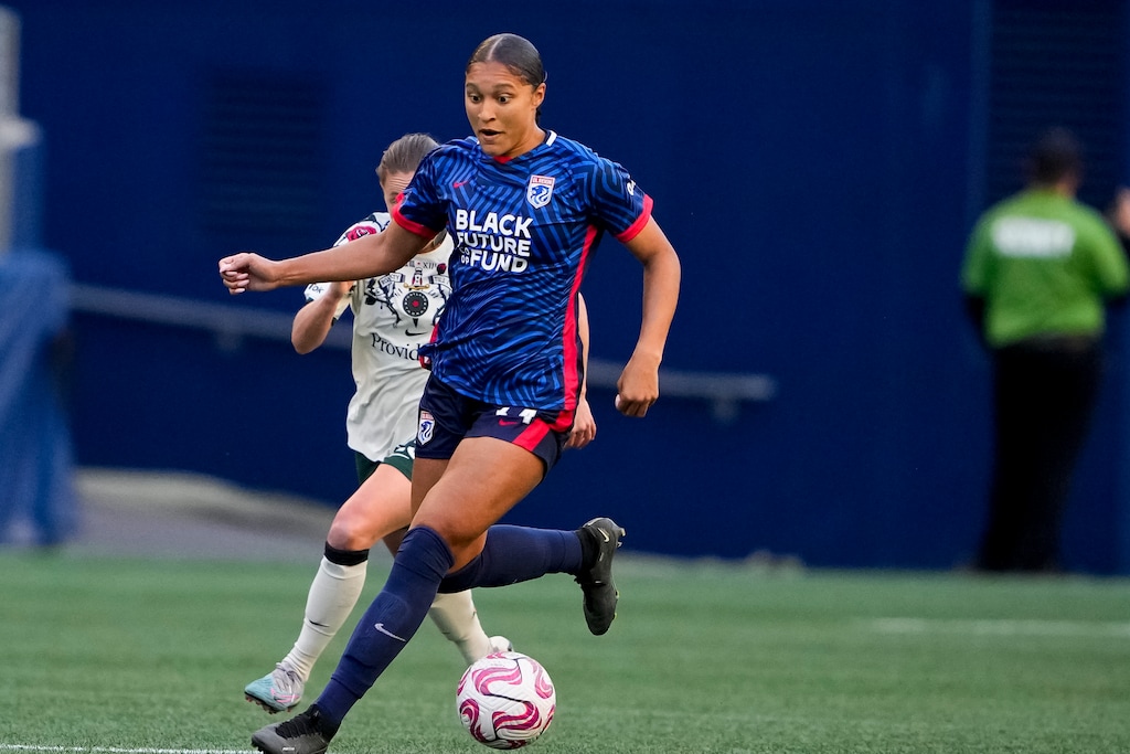 (Lindsey Wasson | AP) OL Reign forward Elyse Bennett (34) moves the ball against the Portland Thorns during the second half of an NWSL soccer match on June 3, 2023, in Seattle. Utah Royals FC selected Bennett in the NWSL expansion draft on Dec. 15, 2023.