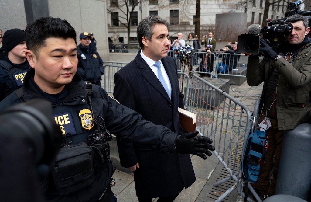 (Craig Ruttle  |  AP file photo)  In this Dec. 12, 2018, photo, Michael Cohen, President Donald Trump's former lawyer, leaves federal court after his sentencing in New York. Trump has gone from denying knowledge of any payments to women who claim to have been mistresses to apparent acknowledgement of those hush money settlements – though he claims they wouldn't be illegal.