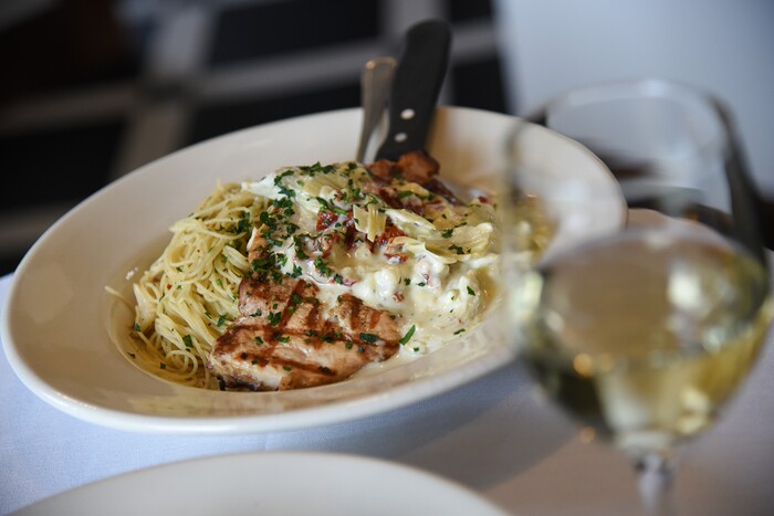 (Francisco Kjolseth  |  The Salt Lake Tribune)  Pollo Alla Gratella, grilled boneless breast of chicken marinated in garlic oil and balsamic vinegar with artichoke hearts, sun-dried tomatoes and gorgonzola cheese at Caffe Molise, recently opened in its new location inside the old (but completely updated) Eagle Building on the southwest corner of 400 South and West Temple.