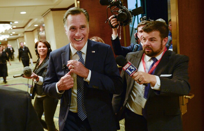 (Francisco Kjolseth  |  The Salt Lake Tribune)  Mitt Romney is pursued by the media hoping to get an answer to a possible run for senate after he spoke at the Utah Economic Outlook & Policy Summit 2018, hosted by the Salt Lake Chamber at the Salt Lake City Marriott Downtown at City Creek on Tuesday, Jan. 16, 2018. 