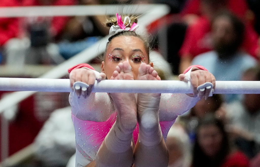 (Bethany Baker  |  The Salt Lake Tribune) Utah’s Makenna Smith performs on the bars as Utah hosts Stanford, NCAA gymnastics at the Huntsman Center in Salt Lake City on Friday, Feb. 23, 2024.