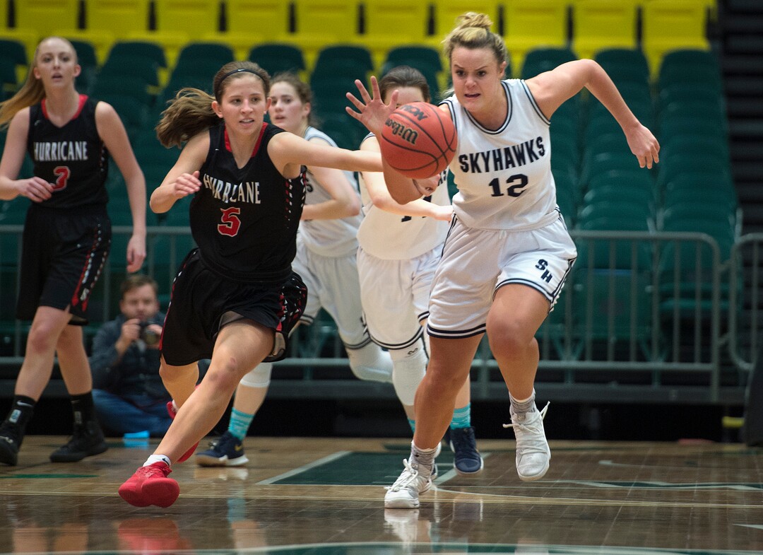 Scott Sommerdorf | The Salt Lake TribuneLauren Gustin hustles to control a loose ball during second half play. Salem Hills beat Hurricane 57-35 for the 4A girl's title, Saturday, March 3, 2018.