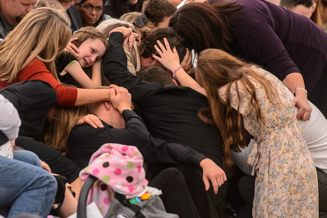(Trent Nelson  |  The Salt Lake Tribune)
David Langford's family embraces each other during the closing hymn at the funeral for Dawna Langford and two of her children, Trevor and Rogan, in La Mora, Sonora, Mexico on Thursday, Nov. 7, 2019.