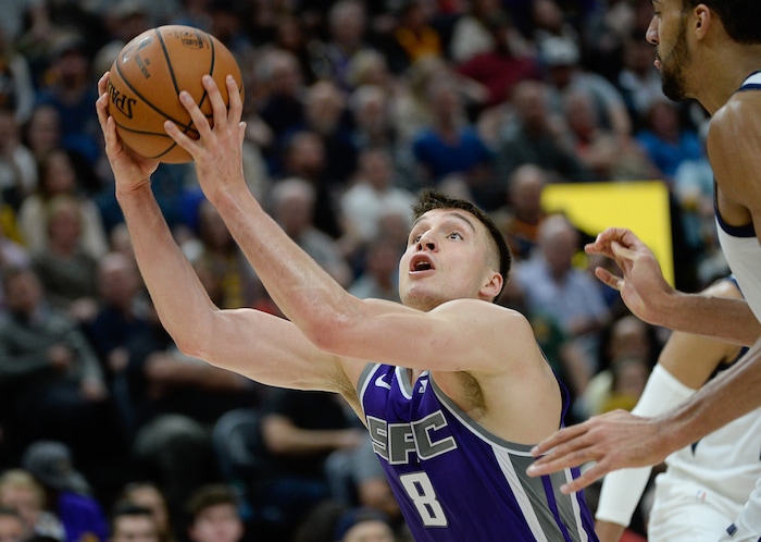 (Francisco Kjolseth  |  The Salt Lake Tribune)  Sacramento Kings guard Bogdan Bogdanovic (8) keeps his eye on the basket as the Utah Jazz host the Sacramento Kings in their NBA game at Vivint Smart Home Arena Friday, April 5, 2019, in Salt Lake City.
