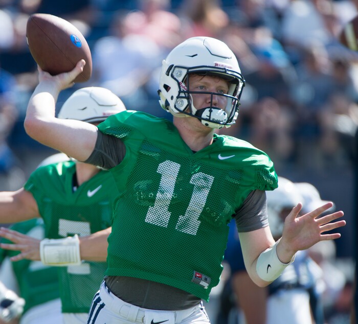 (Rick Egan  |  The Salt Lake Tribune)  Freshman quarterback Joe Critchlow (11) throws the ball, during the BYU scrimmage at Lavell Edwards Stadium, Thursday, August 17, 2017.
