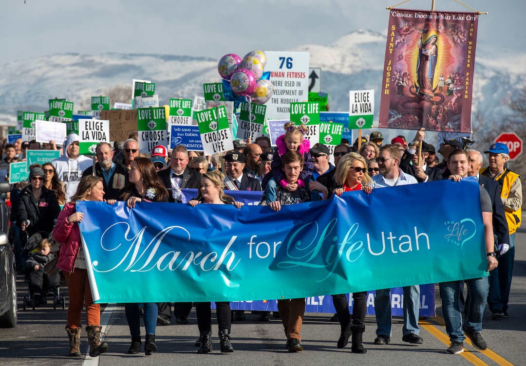 (Rick Egan  |  The Salt Lake Tribune)     Hundreds of marchers walk down 300 North in front of the Utah State Capitol, in the March for Life Utah rally, Saturday, Jan. 25, 2020.