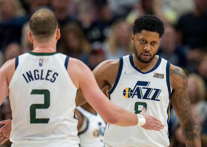 (Rick Egan | The Salt Lake Tribune) Utah Jazz guard Joe Ingles (2) congratulates Utah Jazz forward Rudy Gay (8) after a 3-point shot, in NBA action between Utah Jazz and Toronto Raptors, at Vivint Arena, in Salt Lake City, on  Thursday, Nov. 18, 2021.