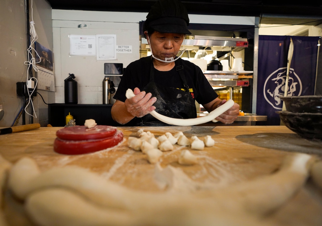 (Chris Samuels | The Salt Lake Tribune) Xiao Xian ge prepares dumplings at Noodle & Dumpling in Salt Lake City, Monday, July 6, 2026.