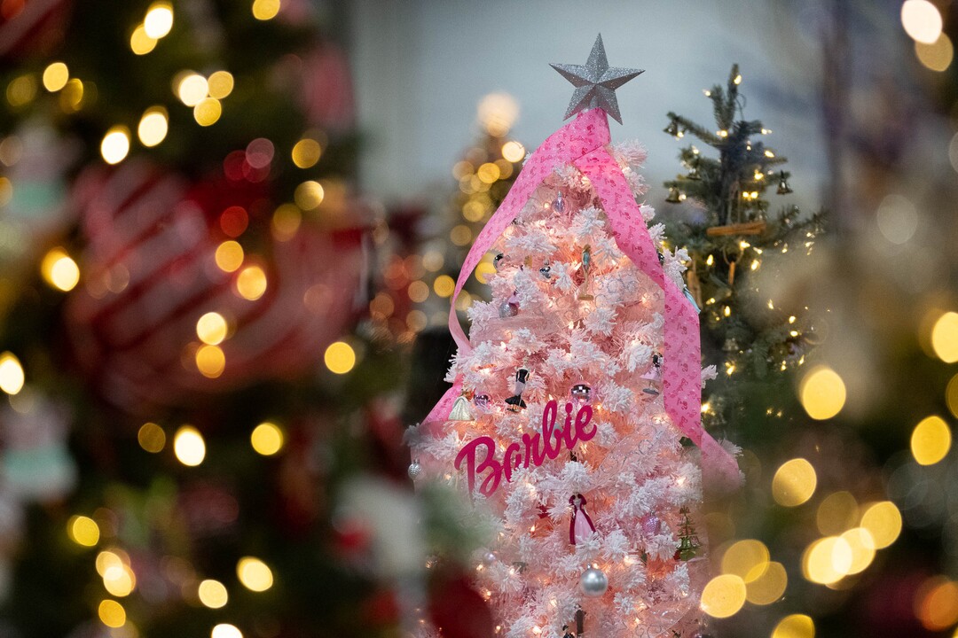 (Francisco Kjolseth | The Salt Lake Tribune) A tree honoring the memory of Julie Ann Craghead Thomas, a lifelong collector of Barbie dolls and memorabilia is displayed during the 51st annual Festival of Trees at the Mountain America Expo Center in Sandy on Tuesday, Nov. 30, 2021.