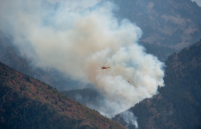 (Francisco Kjolseth  |  The Salt Lake Tribune) Air crews battle a fire in Neffs Canyon on the north side of Mount Olympus on Tuesday, Sept, 22, 2020.