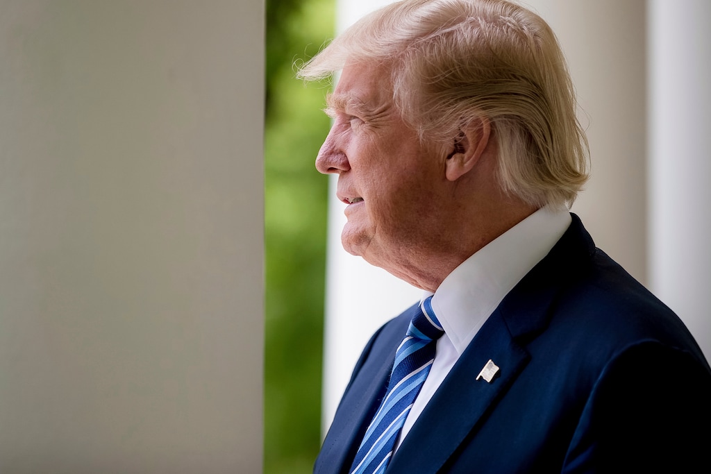 President Donald Trump poses for a photograph along the West Wing Colonnade at the White House in Washington, Friday, April 21, 2017, after a interview with The Associated Press. (AP Photo/Andrew Harnik)