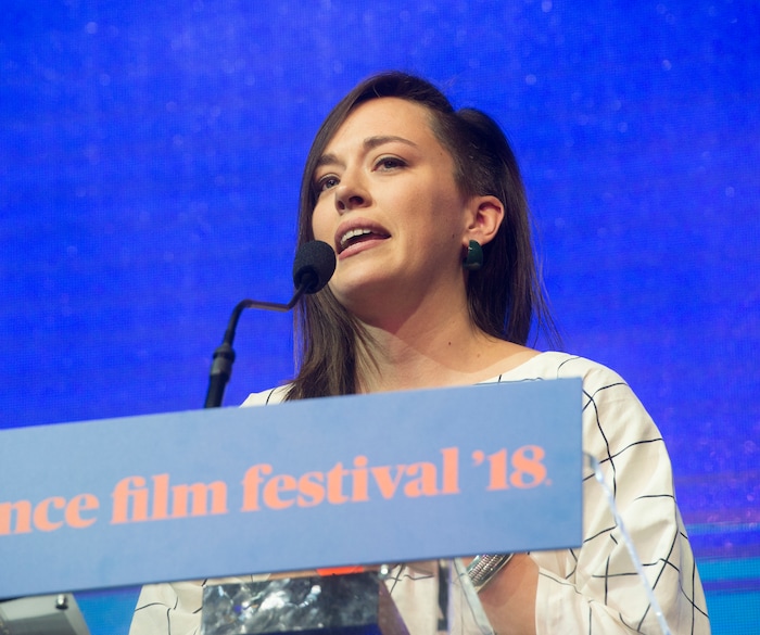 (Rick Egan  |  The Salt Lake Tribune)     Director Alexandria Bombach accepts the award for U.S. Documentary Directing Award for the film On Her Shoulders, at the 2018 Sundance Film Festival Awards Night, Saturday, January 27, 2018.


