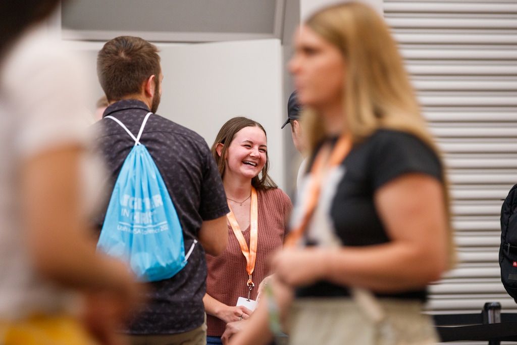 (The Church of Jesus Christ of Latter-day Saints) Attendees visit with one another at the 2023 Utah Area YSA Conference of The Church of Jesus Christ of Latter-day Saints at the Salt Palace in Salt Lake City on Saturday, Aug. 19, 2023.