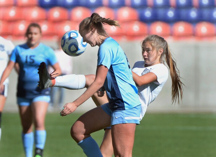 (Scott Sommerdorf | The Salt Lake Tribune)
Sky View's Emily Jensen tries to avoid a kick to the face during first half play. Sky View defeated Bonneville 2-0 to win the 4A title game, Saturday, October 21, 2017.