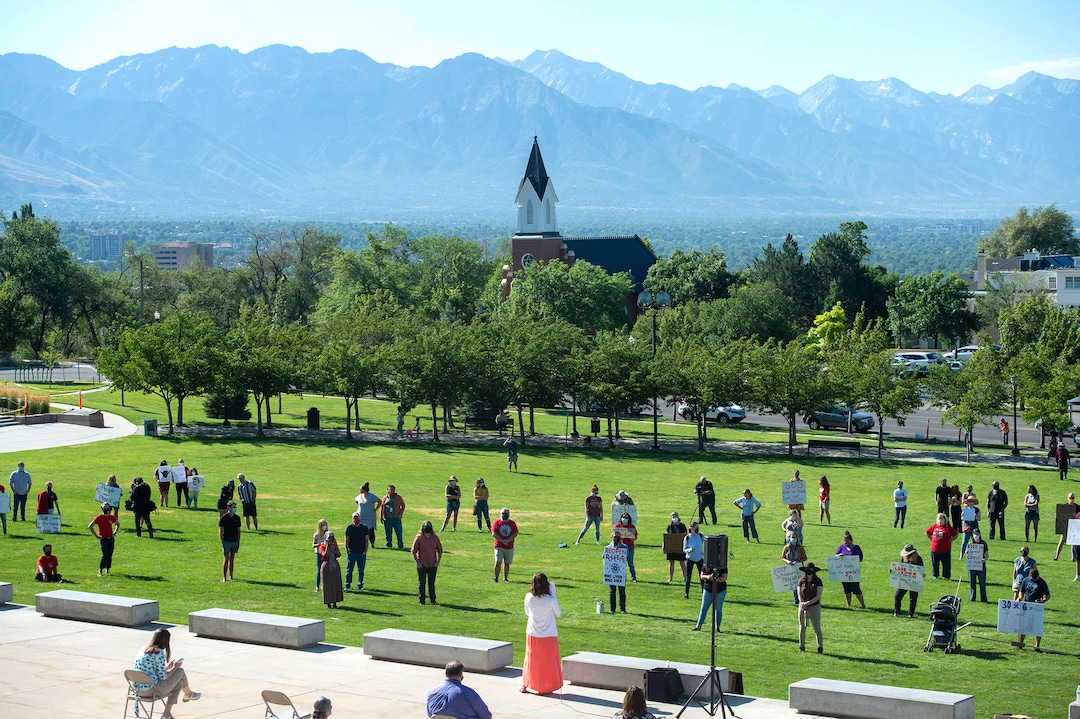 (Rick Egan  |  The Salt Lake Tribune)     Protesters social-distance as Emily Johnson gives a speech, during a Mask-In and Car Caravan protest at the State Capitol to demand the Governor and other state and local leaders ensure that Utah school protect students and staff when schools reopen, on Thursday, July 23, 2020.