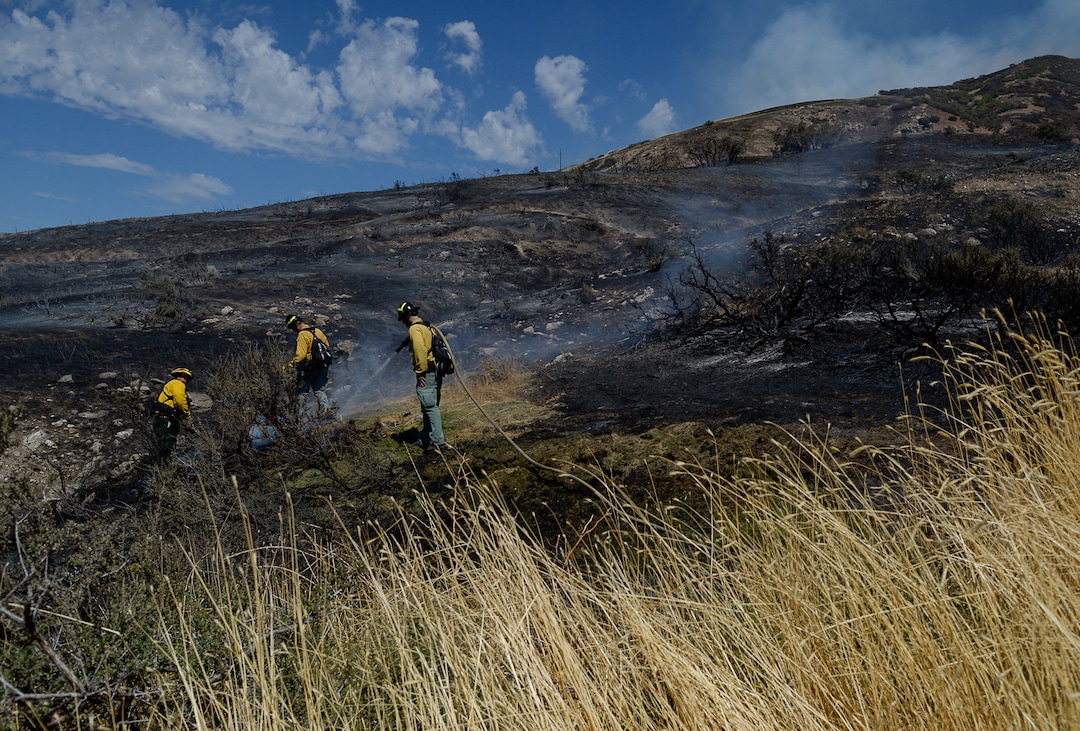 (Francisco Kjolseth  |  The Salt Lake Tribune)  Fire crews battle a fire in Bountiful that destroyed three homes and damaged five more that began early Friday morning, Aug. 30, 2019.  On Sept. 2, officials said the fire was 100% contained.
