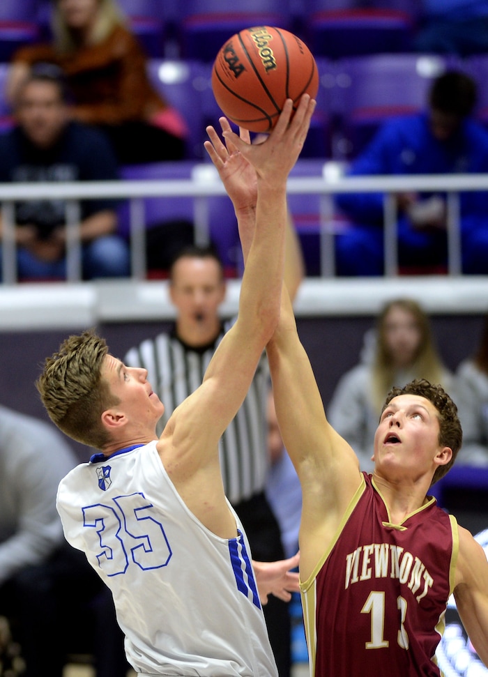 (Steve Griffin  |  Tribune File Photo)  Bingham's Branden Carlson taps the ball away from Viewmont's Lewis Johnson during 5A playoff game at the Dee Events Center in Ogden Wednesday March 1, 2017.