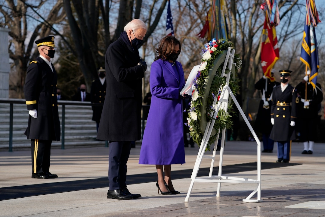 President Joe Biden and Vice President Kamala Harris participate in a wreath laying ceremony at the Tomb of the Unknown Soldier at Arlington National Cemetery in Arlington, Va. (AP Photo/Evan Vucci)