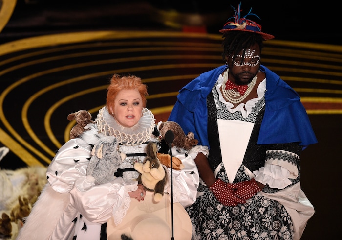 Melissa McCarthy, left, and Brian Tyree Henry present the award for best costume design at the Oscars on Sunday, Feb. 24, 2019, at the Dolby Theatre in Los Angeles. (Photo by Chris Pizzello/Invision/AP)