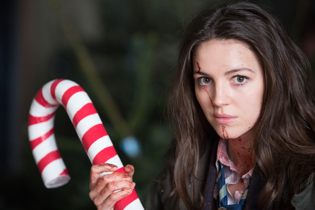 This image released by Orion Pictures shows Ella Hunt in a scene from the film "Anna and the Apocalypse."  (Duncan McCallum/Orion Pictures via AP)
