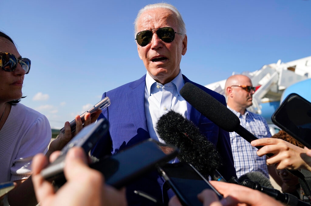 (AP Photo/Evan Vucci, File) President Joe Biden speaks to members of the media after exiting Air Force One, Wednesday, July 20, 2022, at Andrews Air Force Base, Md.