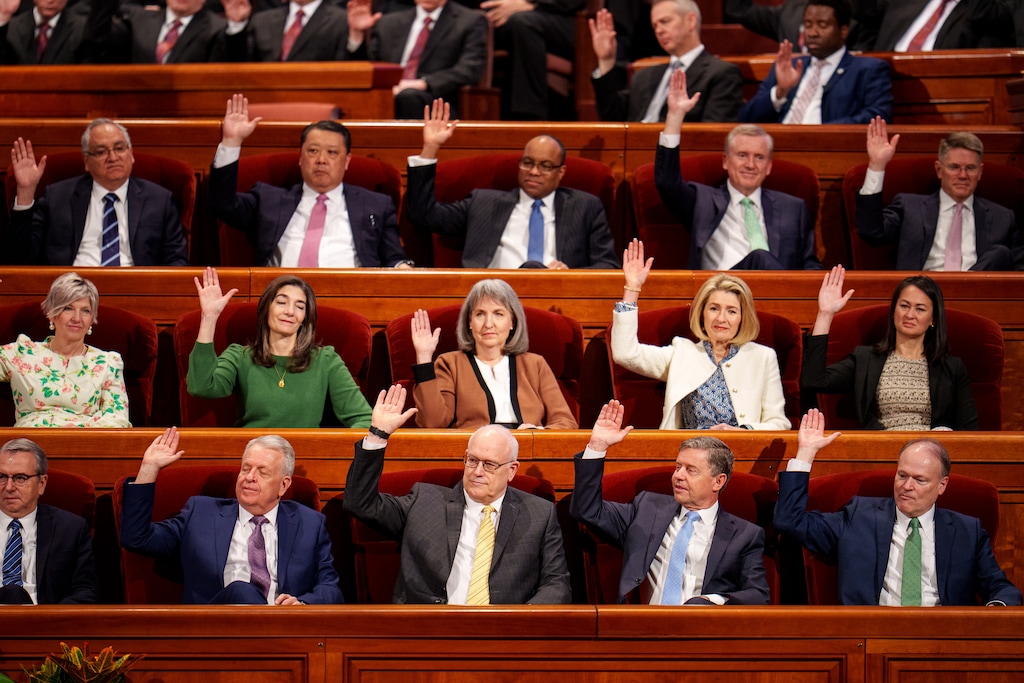 (Trent Nelson  |  The Salt Lake Tribune) High-level women's officers take part in sustaining of church leaders at General Conference on Saturday, April 6, 2024. Top women's leaders in the church serve on male-dominated executive councils.