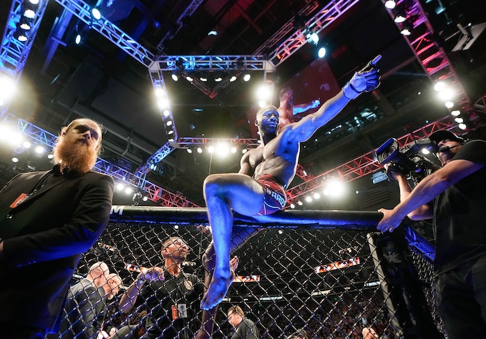 (Francisco Kjolseth | The Salt Lake Tribune) UFC fighter Leon Edwards, of Jamaica, celebrates his title as welterweight champion of the world after knocking out Nigerian UFC fighter Kamaru Usman during the UFC 278 mixed martial arts title bout in Salt Lake City on Saturday, Aug. 20, 2022.