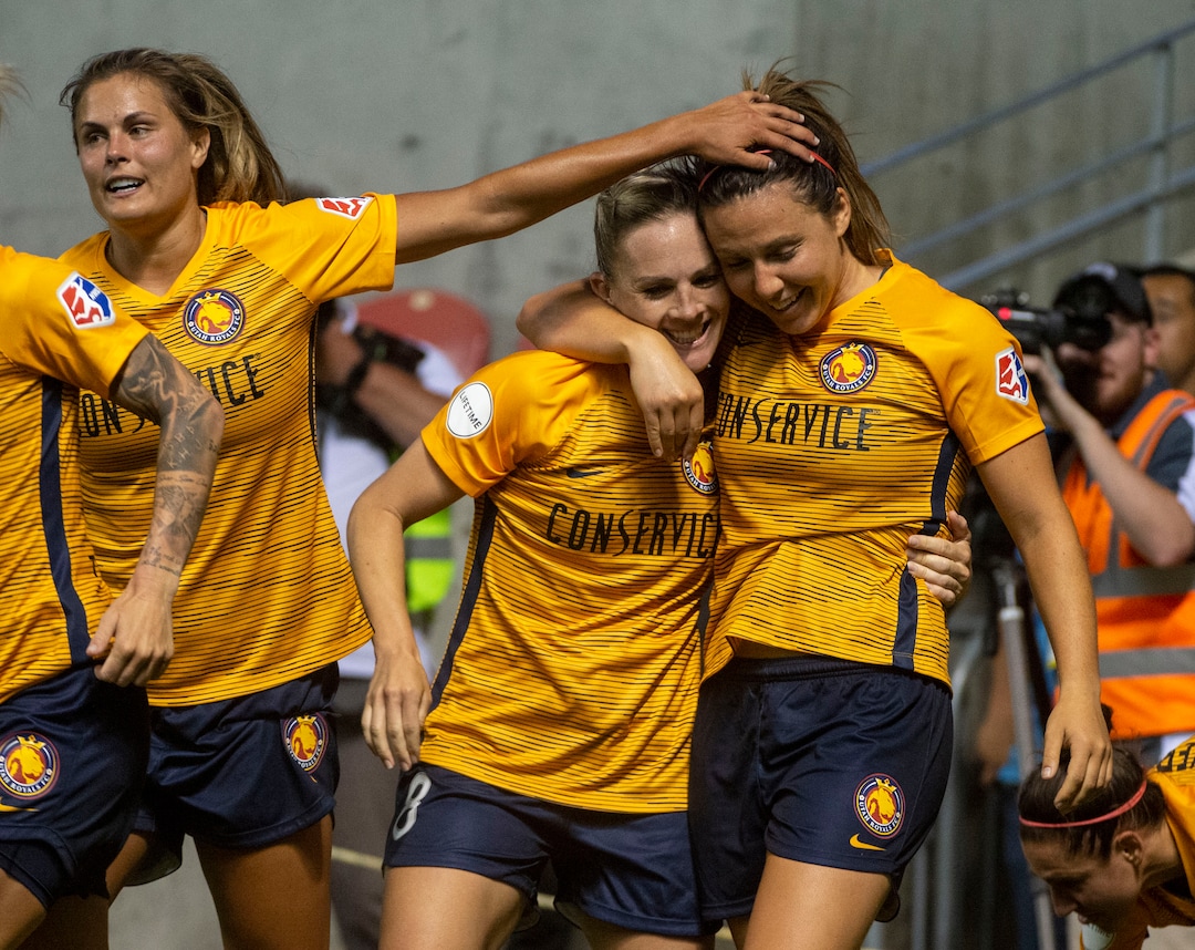 (Rick Egan  |  The Salt Lake Tribune)    Utah Royals FC midfielder Gunnhildur Jónsdóttir (66) celebrates after Utah Royals FC defender Rachel Corsie (2) scored the game tying goal, in Soccer action between Utah Royals FC and Portland Thorns FC, in Sandy, Friday, July 19, 2019.