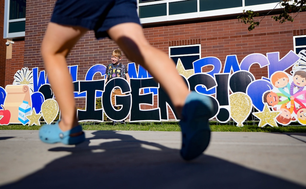 (Francisco Kjolseth | The Salt Lake Tribune) Students and staff at Centennial Elementary, part of the Alpine School District, celebrate the first day of school on Wed Aug. 19, 2026. Next fall, Alpine will split into three, and Centennial will be part of the new Timpanogos School District.