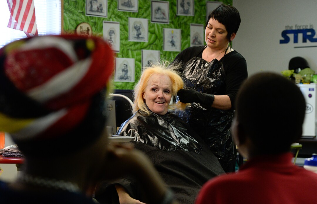 (Francisco Kjolseth  |  The Salt Lake Tribune)  Teachers are using creative ways to get kids SAGE scores up, including Sharon Moore, 6th grade teacher at North Star Elementary who agreed to dye her hair some wild colors as she continues to teach class on Tuesday, May 8, 2018, with the help of Merb Jones. This was the incentive that got her kids' scores up nearly 17 percent.
