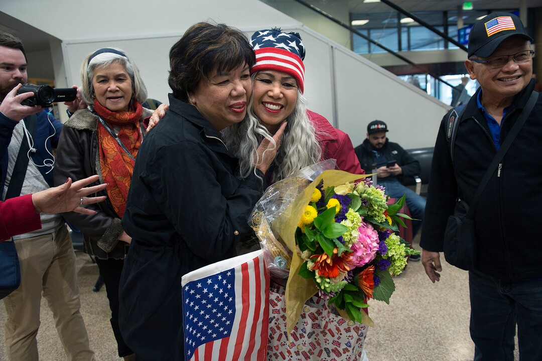 Scott Sommerdorf | The Salt Lake Tribune
Corazon Espinosa, center, hugs her sister Teena Jensen after arriving from Australia, via Los Angeles, Thursday, March 1, 2018. Espinosa has been trying to legally immigrate to the U.S. for 40 years.