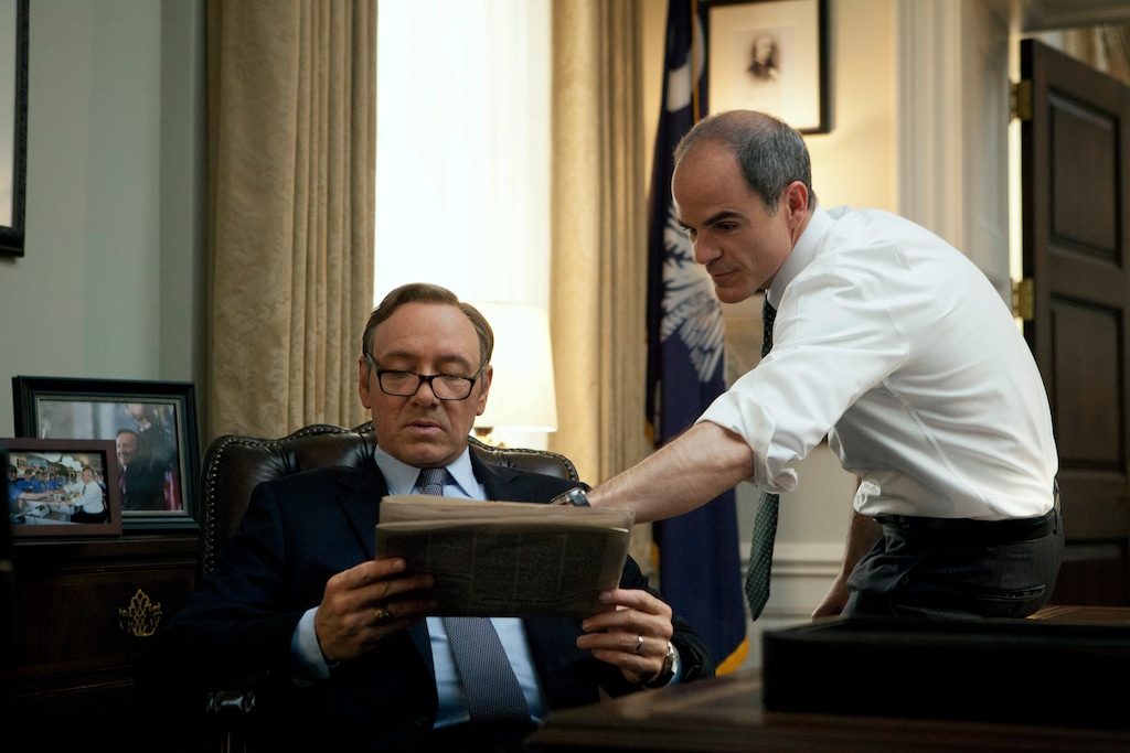 (Netflix via The Associated Press) In this image released by Netflix, Kevin Spacey, left, and Michael Kelly appear in a scene from "House of Cards." Netflix says Kevin Spacey is out at "House of Cards" after a series of allegations of sexual harassment and assault.