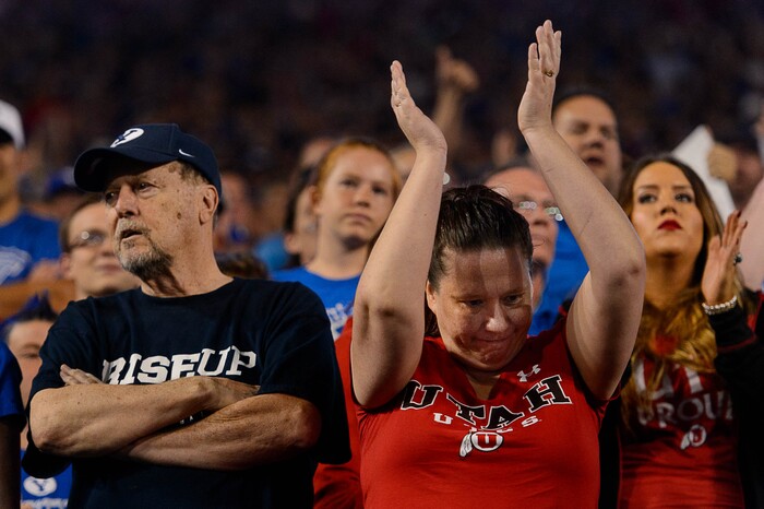 (Trent Nelson | The Salt Lake Tribune)  Fans react to a call going in Utah's favor as BYU hosts Utah, NCAA football in Provo, Saturday September 9, 2017.
